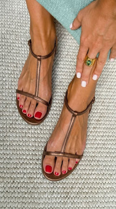 Noelle - T Bar Flat Sandals — Bronze