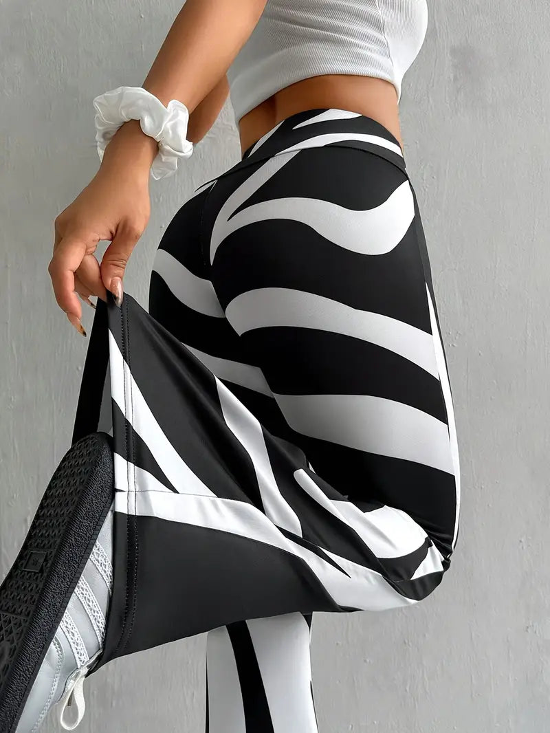 Trudy - Zebra Print Flare Trousers — Black